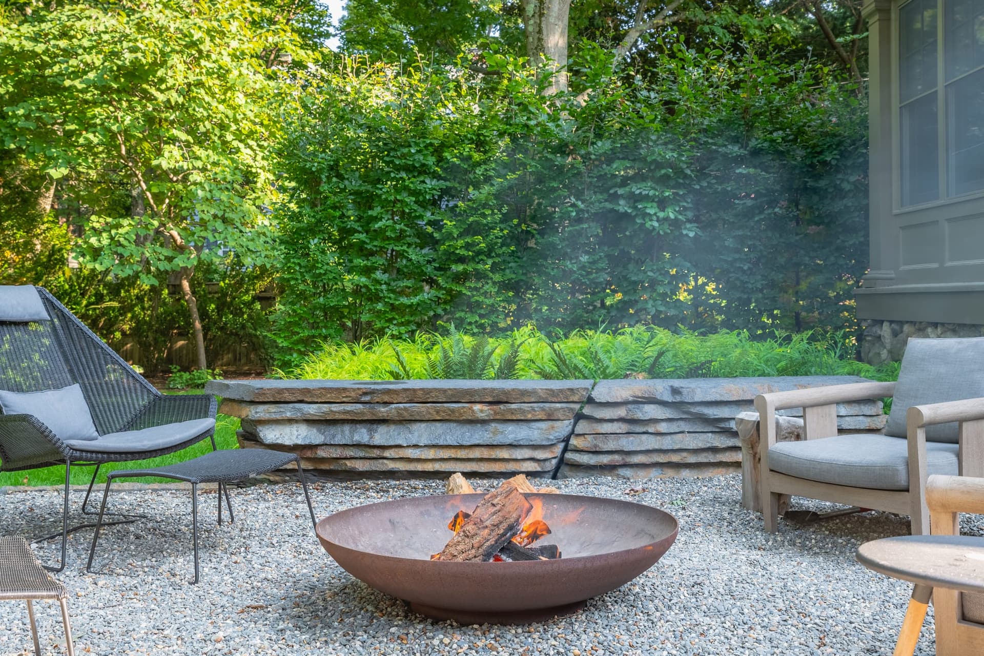 Circuit Road — granite seat wall around the fire pit terrace in Chestnut Hill, MA