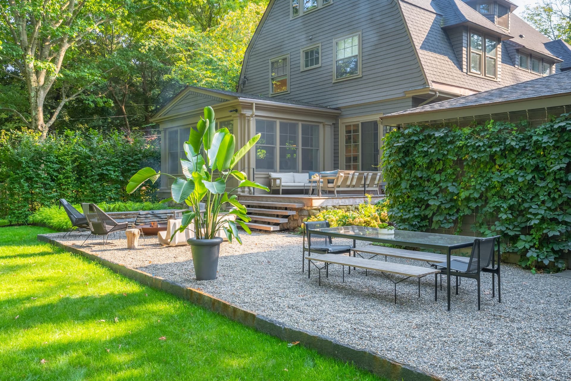 Circuit Road — gravel terrace and dining area behind the house in Chestnut Hill, MA