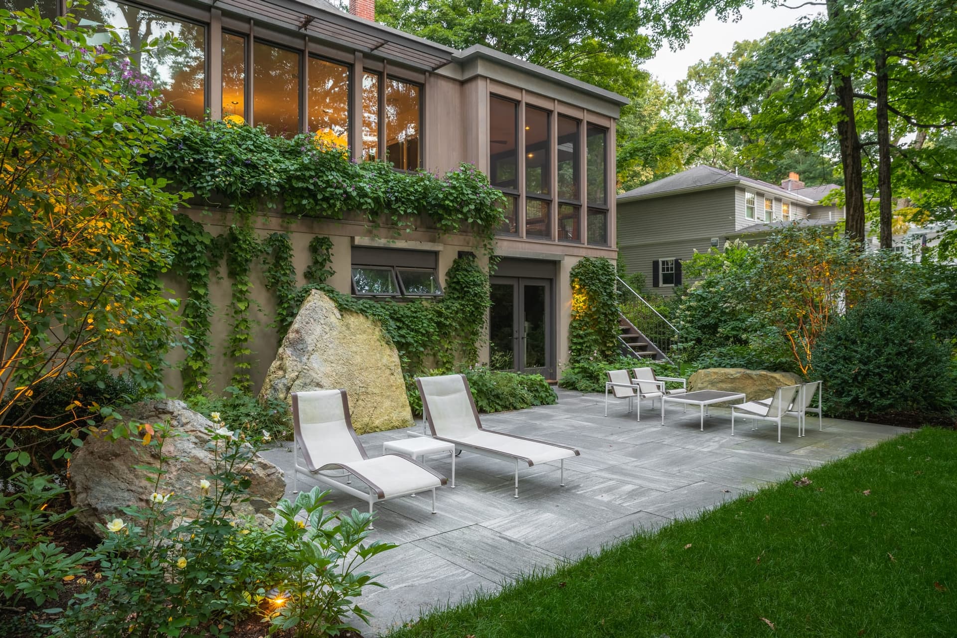 Abbott Road — bluestone terrace and preserved boulder in Wellesley, MA