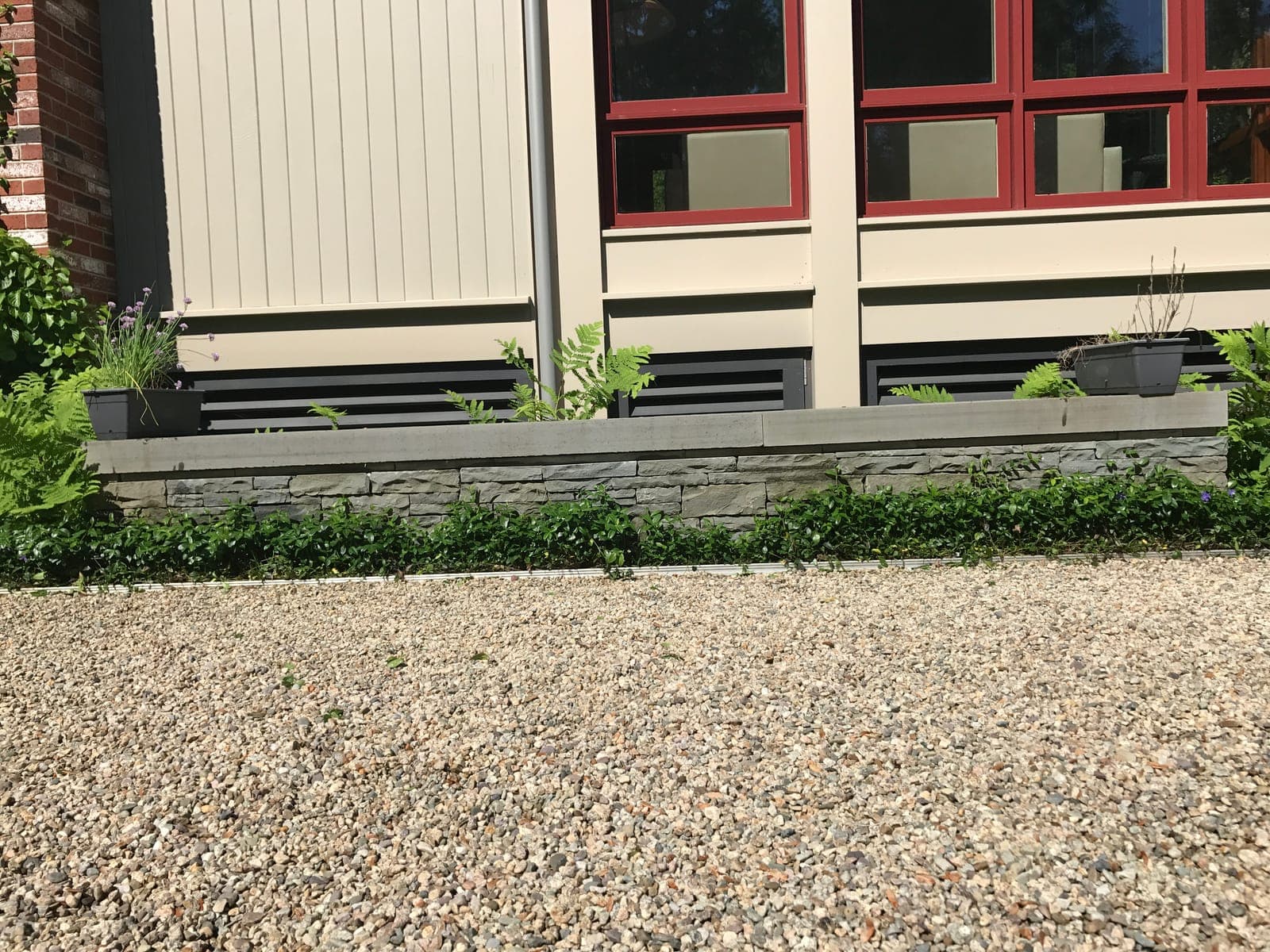Hand-set fieldstone wall, patio, and walkway in Needham, MA