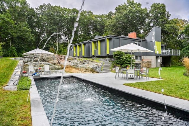 Pool terrace and gardens with stonework