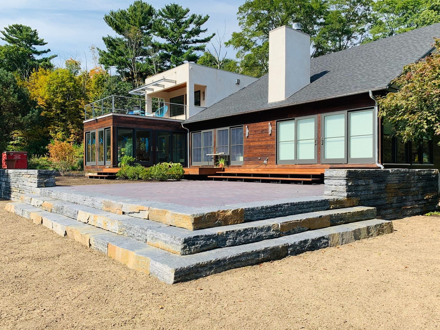 Natural stone patio with steps in Weston, MA