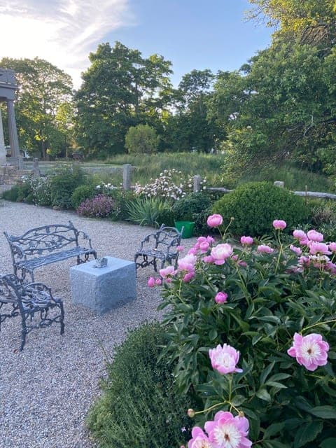 Granite Terraces — peony garden and gravel walk inside the granite walls in Westport, MA
