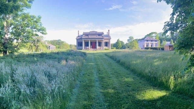 Meadow approach to a coastal home in Westport, MA